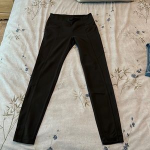 Athleta, size small leggings with four functional pockets.